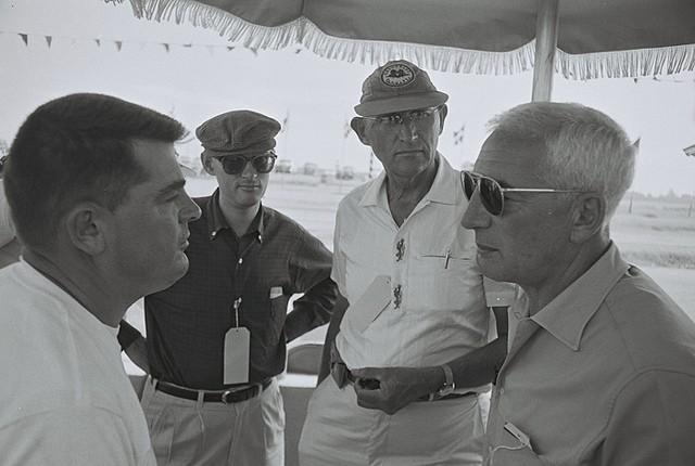 Zora Arkus-Duntov talks with Corvette owner Mickey Thompson before 1962 riverside 3 hr enduro